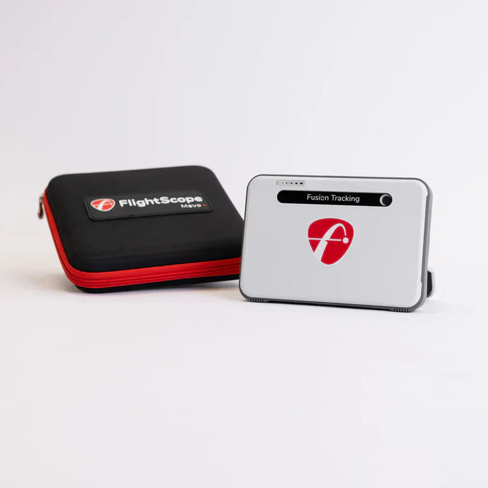 FlightScope Mevo Plus radar launch monitor positioned behind golfer during practice