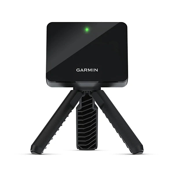 Garmin Approach R10 radar launch monitor positioned behind golfer at driving range